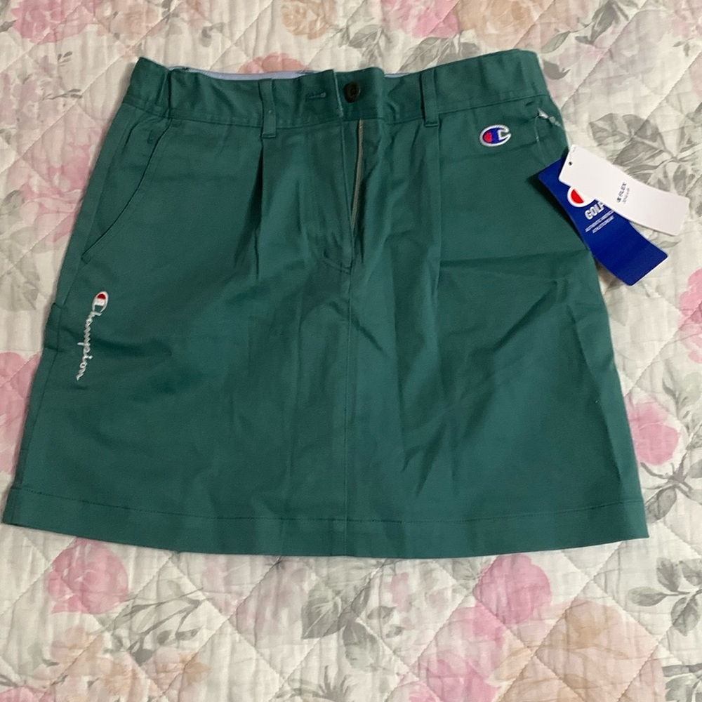 Champion mini skirt. Size medium, brand new with tags